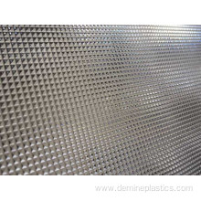 Light diffusing prismatic sheet for advertising